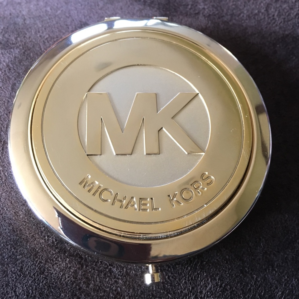 MK compact mirror never used